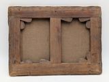 an old picture frame with a picture of two birds on it