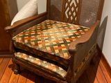 a chair that is sitting in a room with wood floors