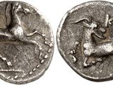 une pièce d'argent sur laquelle figurent un cheval et un oiseau