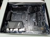 a box with a motherboard inside of it on a table
