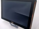 a tablet that is sitting on top of a stand