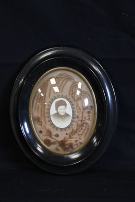 a clock that is sitting on a black table