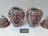 three vases sitting next to each other on a table
