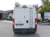 a white van that is parked in a parking lot
