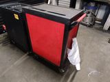 a red and black box sitting on a table