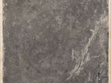a close up of a black and white photo of a square stone slab