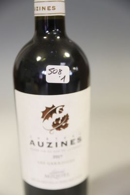 a bottle of wine that is sitting on a table