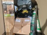 a cardboard box filled with various items and supplies
