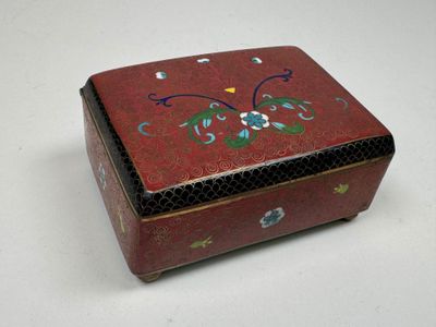 an image of a red box with a floral design on it