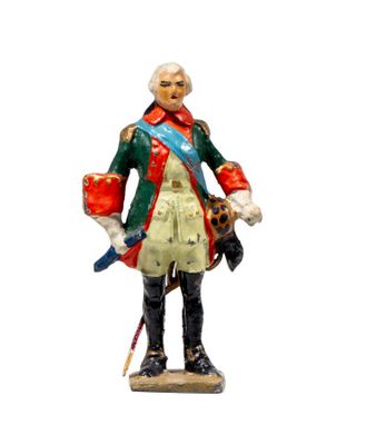figurine of a man dressed in a military uniform with a sword
