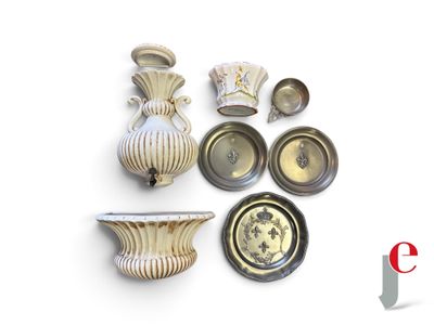 a group of vases and bowls sitting on a table