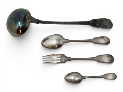 several spoons, forks and spoon rest on a white surface