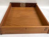 an image of a wooden tray with numbers on it