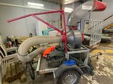 an image of a machine that is in a garage