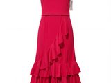 a women ' s red dress with ruffles on a hanger