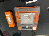 an orange and grey box that is sitting on a table