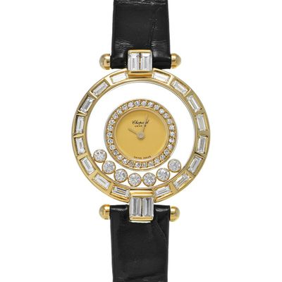 a close up of a gold and diamond watch with black leather strap