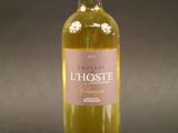 a bottle of wine that is sitting on a table