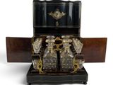 a black and gold box with a set of glasses in it
