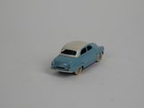 a small toy car that is sitting on a table