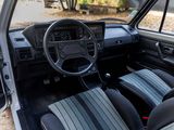 a car with a steering wheel and a dash board in it