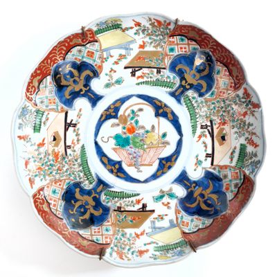 a plate with a design on it on a white surface