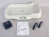 an image of a bath tub with a remote control