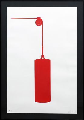 a framed picture of a red canister with a red handle