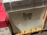 many boxes on a pallet in a warehouse