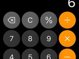 an image of a calculator on the screen of a cell phone