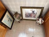 a picture of a room with a picture on the wall and a pair of shoes on the floor