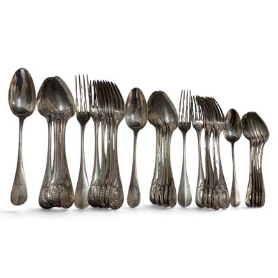 a lot of spoons and forks lined up in a row