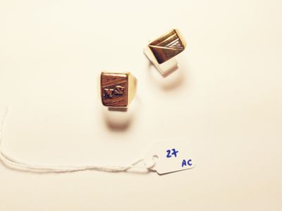 two rings on a string with a price tag attached to them