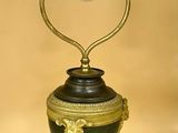 a lamp that is sitting on a table next to a bug