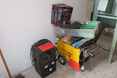 a pile of assorted items sitting on the floor