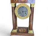 a clock that is sitting on top of a table