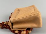 chanel beige quilted lambskin flap bag with chain strap