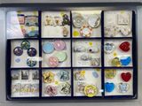 a display case with many different types of buttons in it