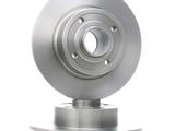 a close up of a metal object on a white surface