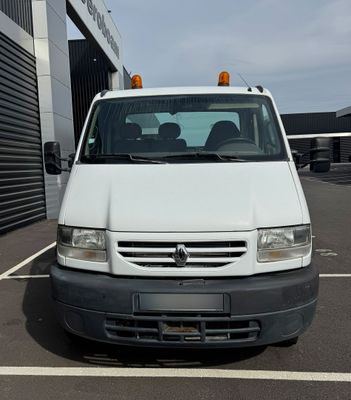 a picture of a white van parked in a parking lot