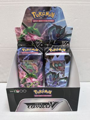 display of pokemon trading cards in a box on a table