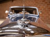 a close up of a car with a hood ornament on it
