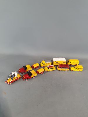 a lot of toy trucks that are lined up together