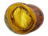 a close up view of a yellow and brown hat