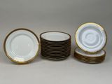 several plates are stacked on top of each other on a table