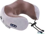 a close up of a neck pillow with a cord attached to it