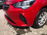 a picture of a red car parked in a parking lot