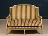 an image of a chair with a striped upholstered seat