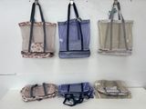four bags hanging on the wall in the room