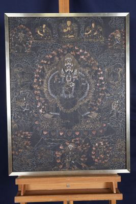 an image of a painting on a wooden easel with a blue background